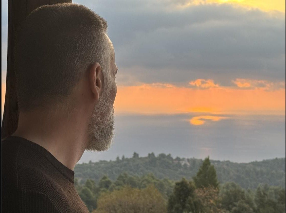Caesar Mikael at sunset over Mount Athos